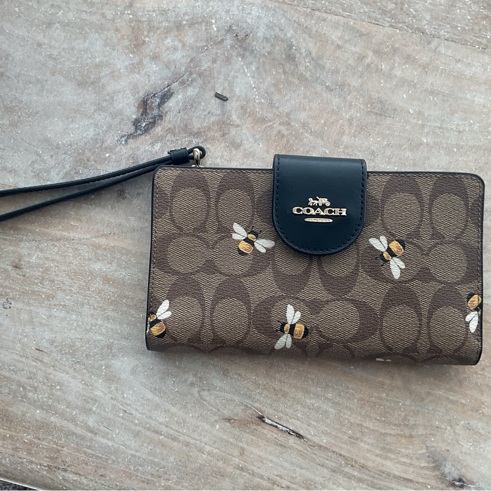Coach Tan and Black Bee Pattern Wristlet
